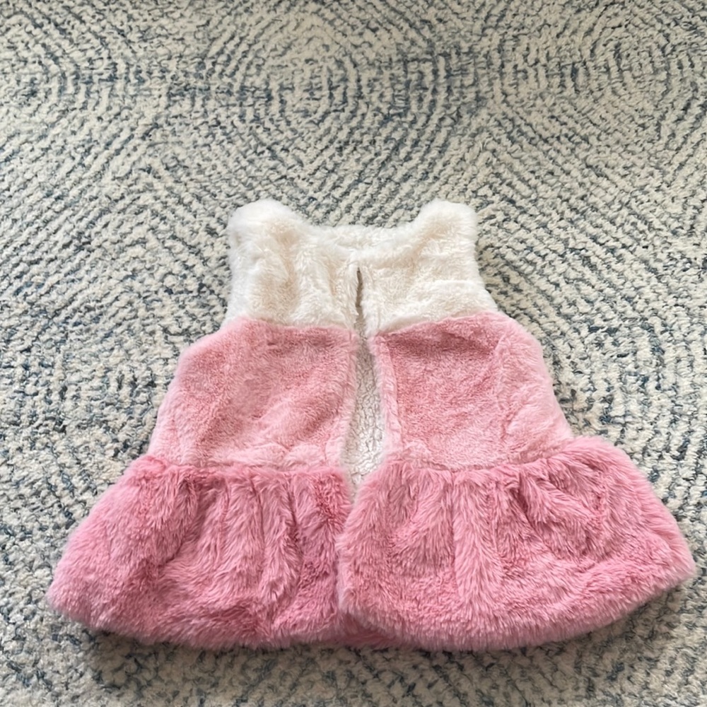 Pink and white furry vest. 12-18 months